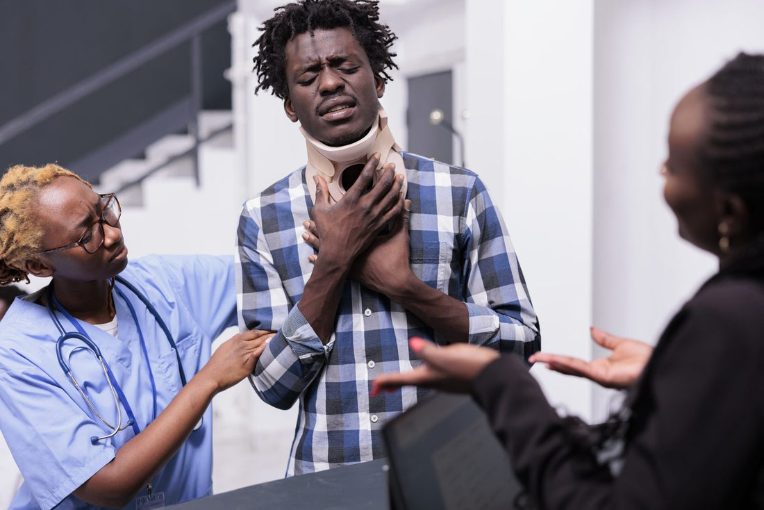 Man with medical neck brace receiving support